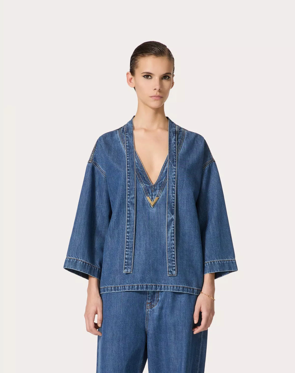 Blue Valentino Medio Denim Kaftan for women, featuring relaxed fit and casual style, displayed on a hanger.
