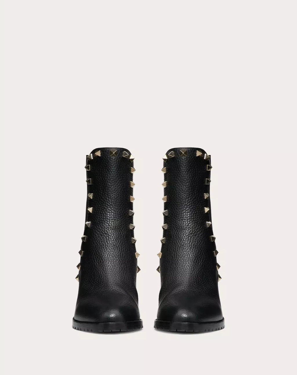 Valentino Rockstud grainy calfskin ankle boot with 80mm heel and signature stud accents, stylish and luxurious footwear.
