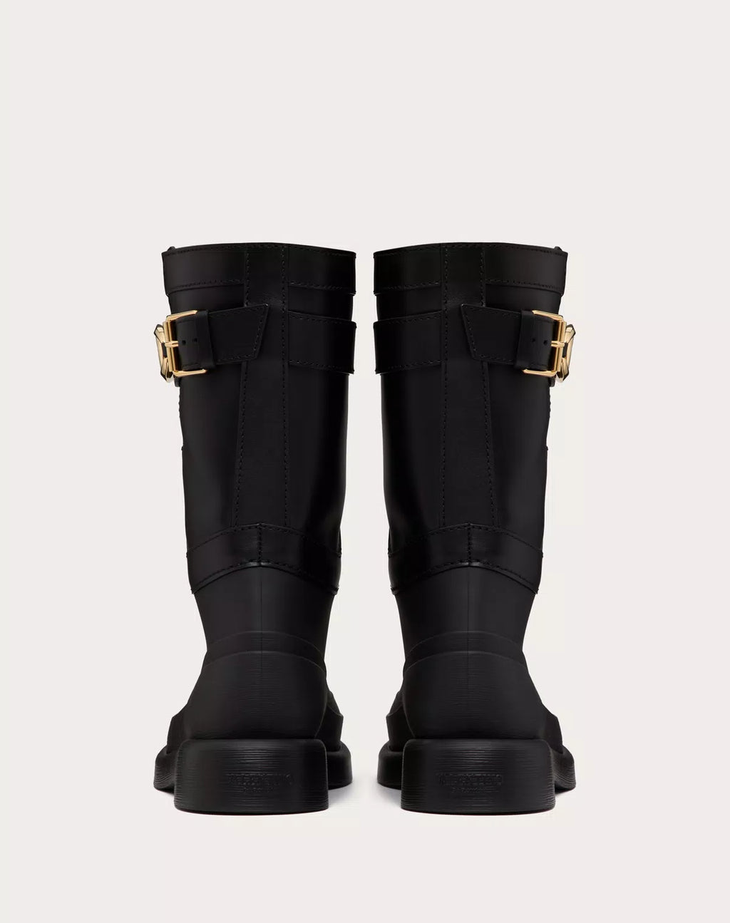 Valentino Vlogo The Bold Edition women's rubber and calfskin boots with 35mm heel, featuring the signature Valentino logo design.