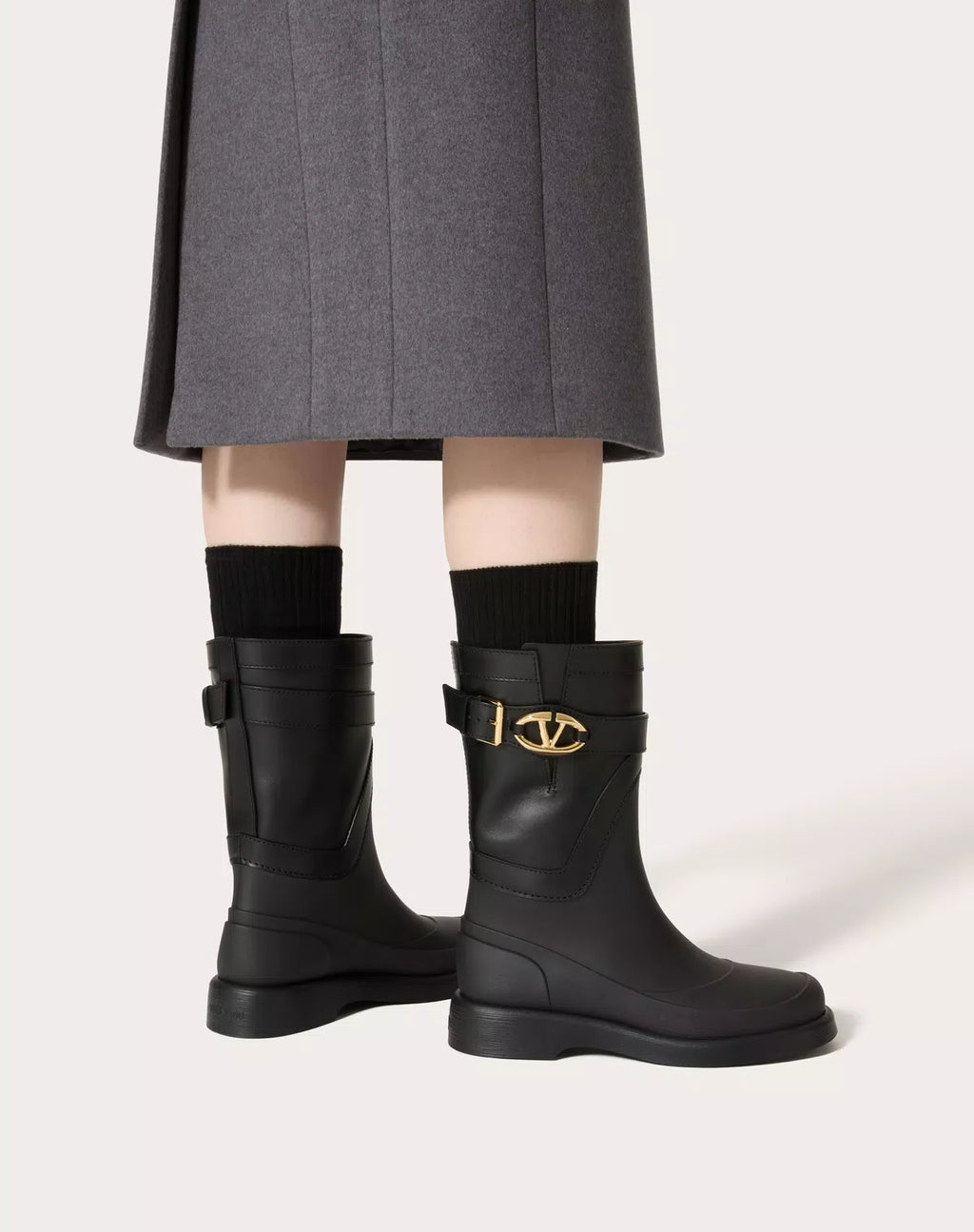 Valentino Vlogo The Bold Edition women's rubber and calfskin boots with 35mm heel, showcasing sleek design and bold logo accents.