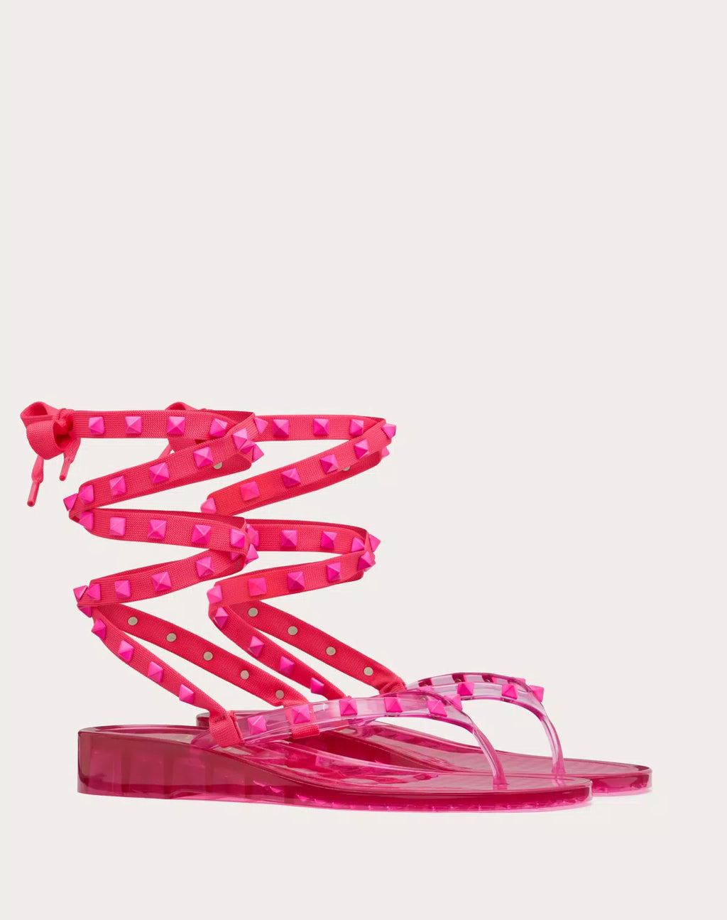 Valentino Rockstud rubber thong sandal for women with matching studs and 30mm heel, stylish and trendy footwear.
