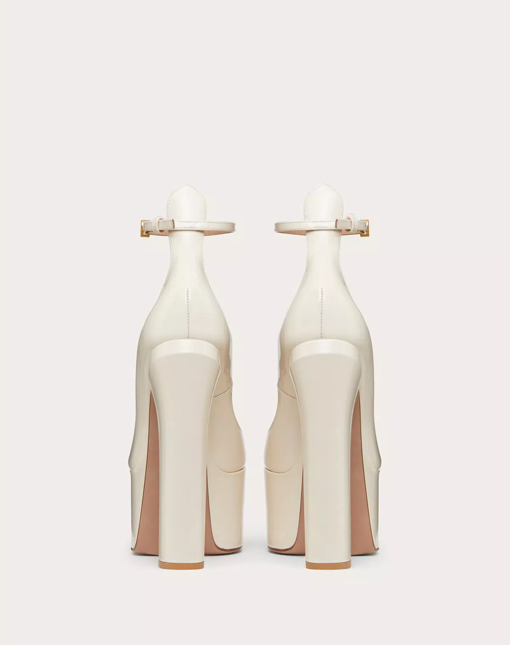 Valentino Garavani Tan-go patent leather platform pump with 155mm heel, stylish women's shoes with sleek design.
