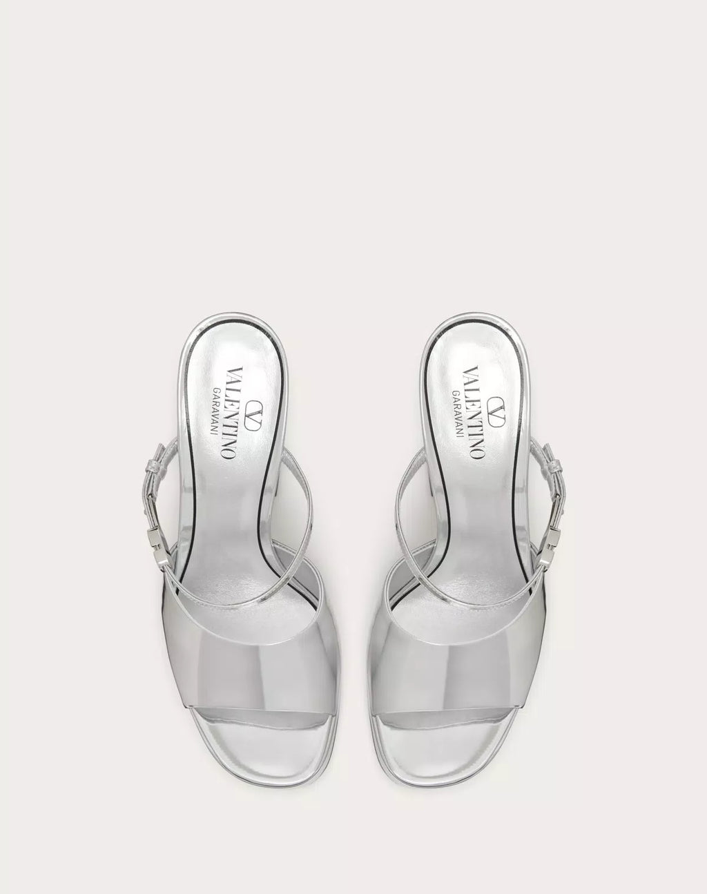 Valentino Garavani Tan-go mirror-effect platform slide sandals for women, featuring a 155mm heel and sleek reflective design.