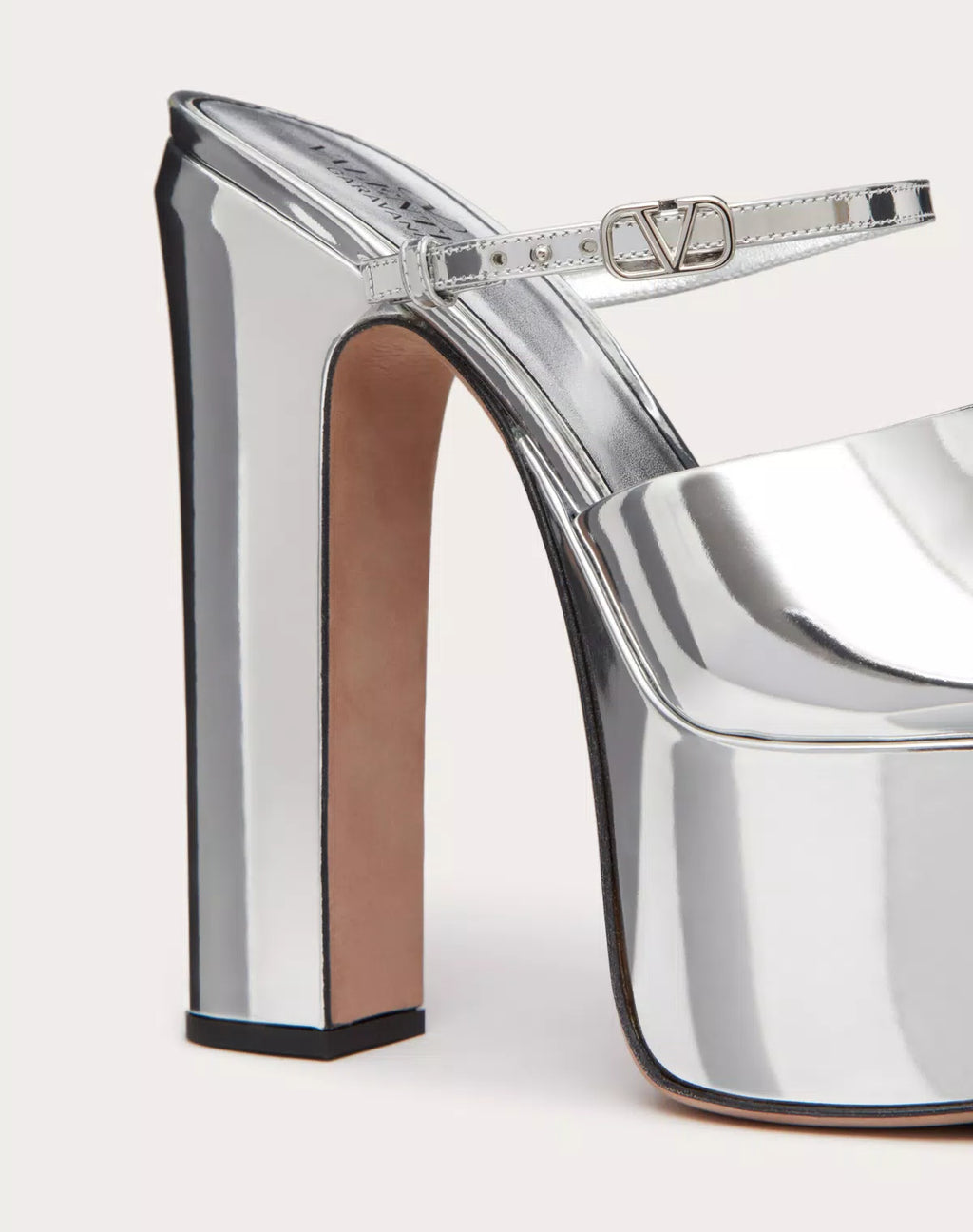 Valentino Garavani Tan-go mirror-effect platform slide sandals for women with 155mm heel, stylish and reflective footwear.