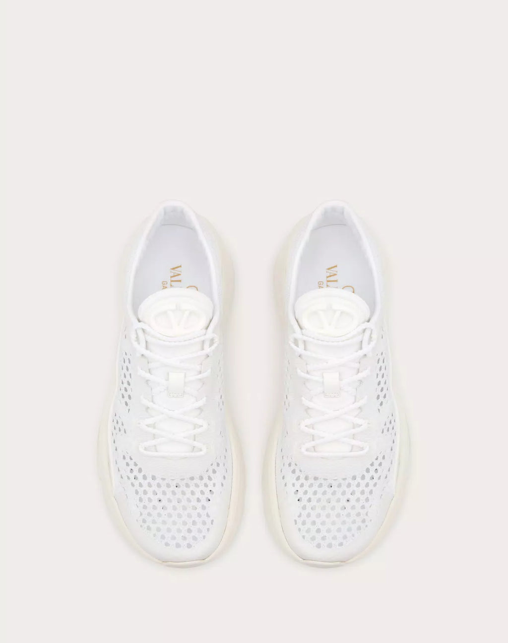 Valentino True Actress Mesh Sneakers for women featuring stylish mesh design and sleek branding.