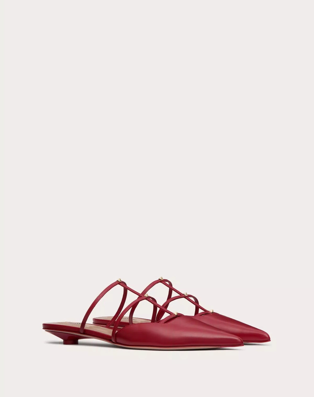 Valentino Rockstud Wispy Calfskin Mules for women with 20mm heels, showcasing elegant calfskin material and signature stud details.