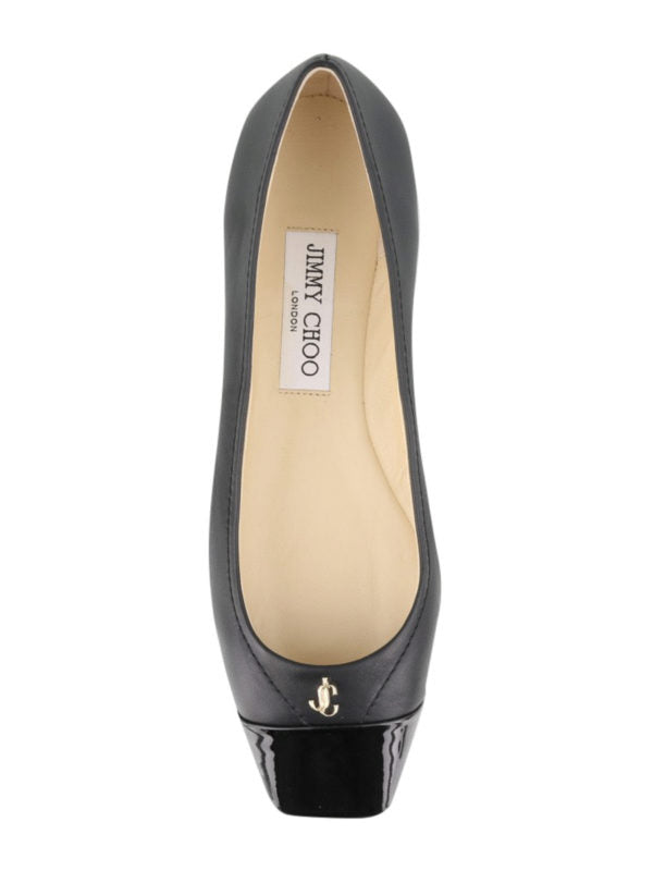 Black leather and patent cap-toe ballet flats from Jimmy Choo, stylish women's pumps with elegant design.