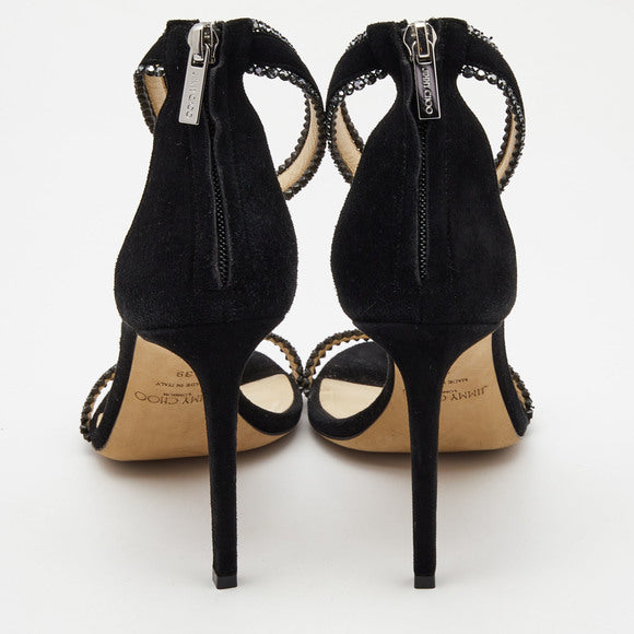 Black suede Jimmy Choo women’s ankle strap heels with crystal embellishments, stylish and elegant footwear.
