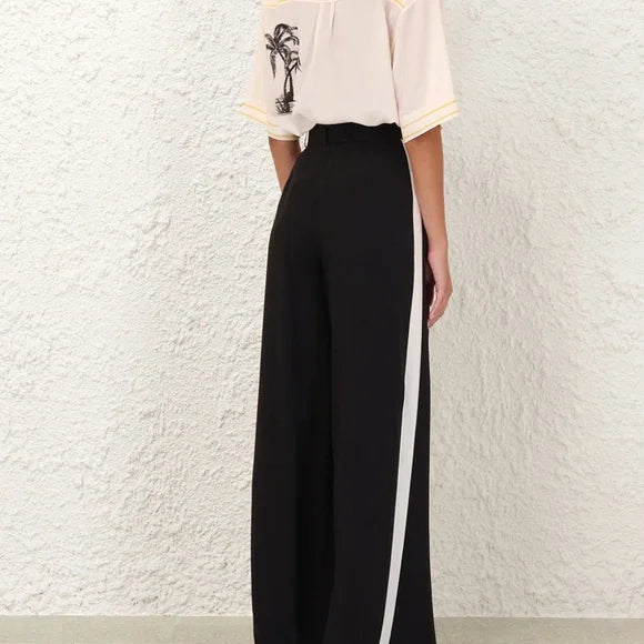 Black Zimmermann women's track pant with adjustable drawstring waist and relaxed fit, ideal for casual and athletic wear.