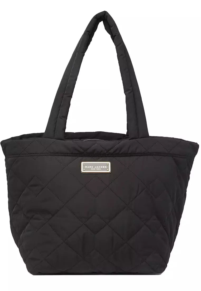 Medium quilted nylon tote bag by Marc Jacobs with top handles and spacious interior, stylish and functional for women's everyday use.