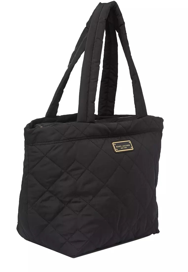 Medium quilted nylon tote bag by Marc Jacobs with top handles and spacious interior, stylishly designed for women.