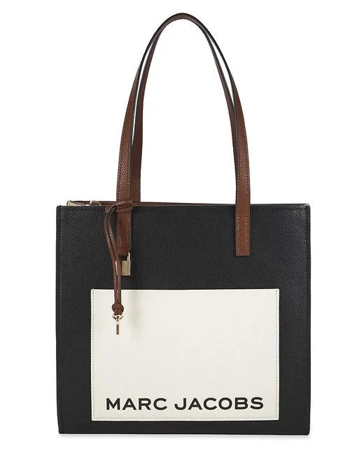 Black Marc Jacobs Grind Logo leather tote bag with multiple logo patterns, stylish and spacious for everyday use.