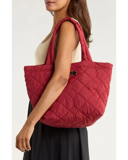 Medium quilted nylon tote bag by Marc Jacobs, designed for women, featuring a stylish quilted pattern and spacious interior.
