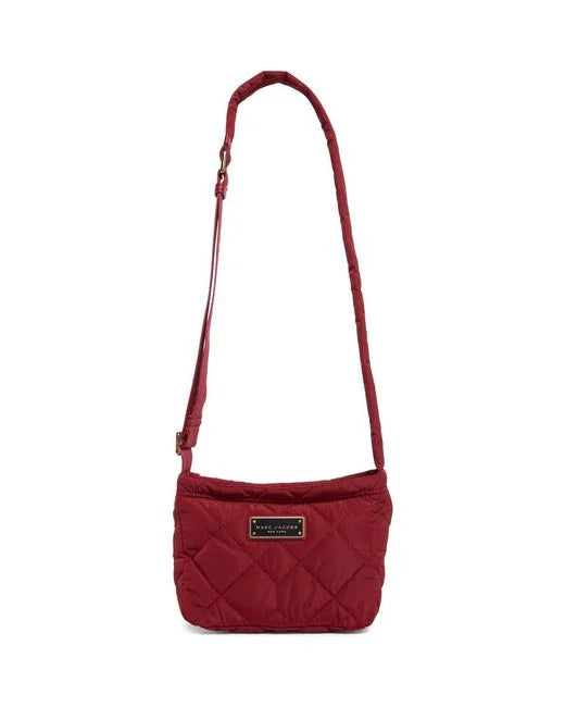 Marc Jacobs women's quilted nylon crossbody bag with adjustable strap and sleek design.