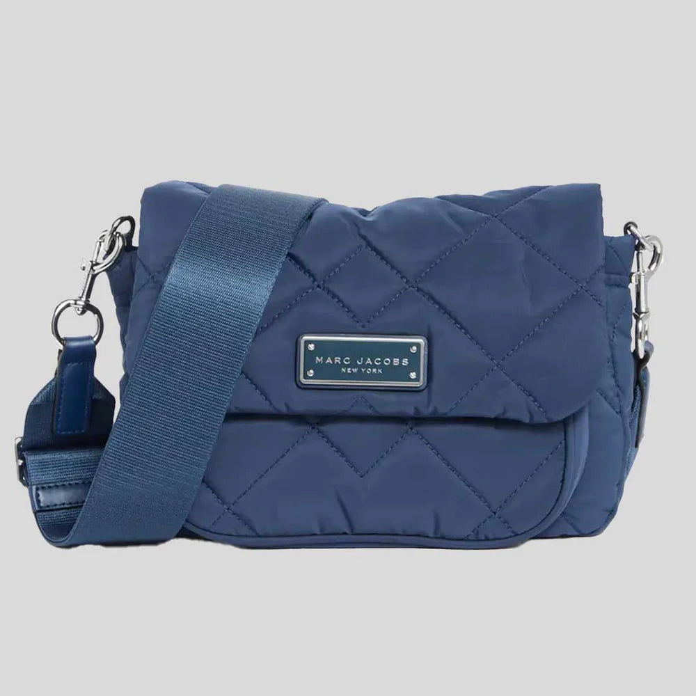 Marc Jacobs women's quilted nylon crossbody bag with adjustable strap and zip closure. Black color, stylish and compact.