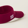 Nylon Miu Miu visor with matching pouch, stylish accessories for sun protection and fashion.