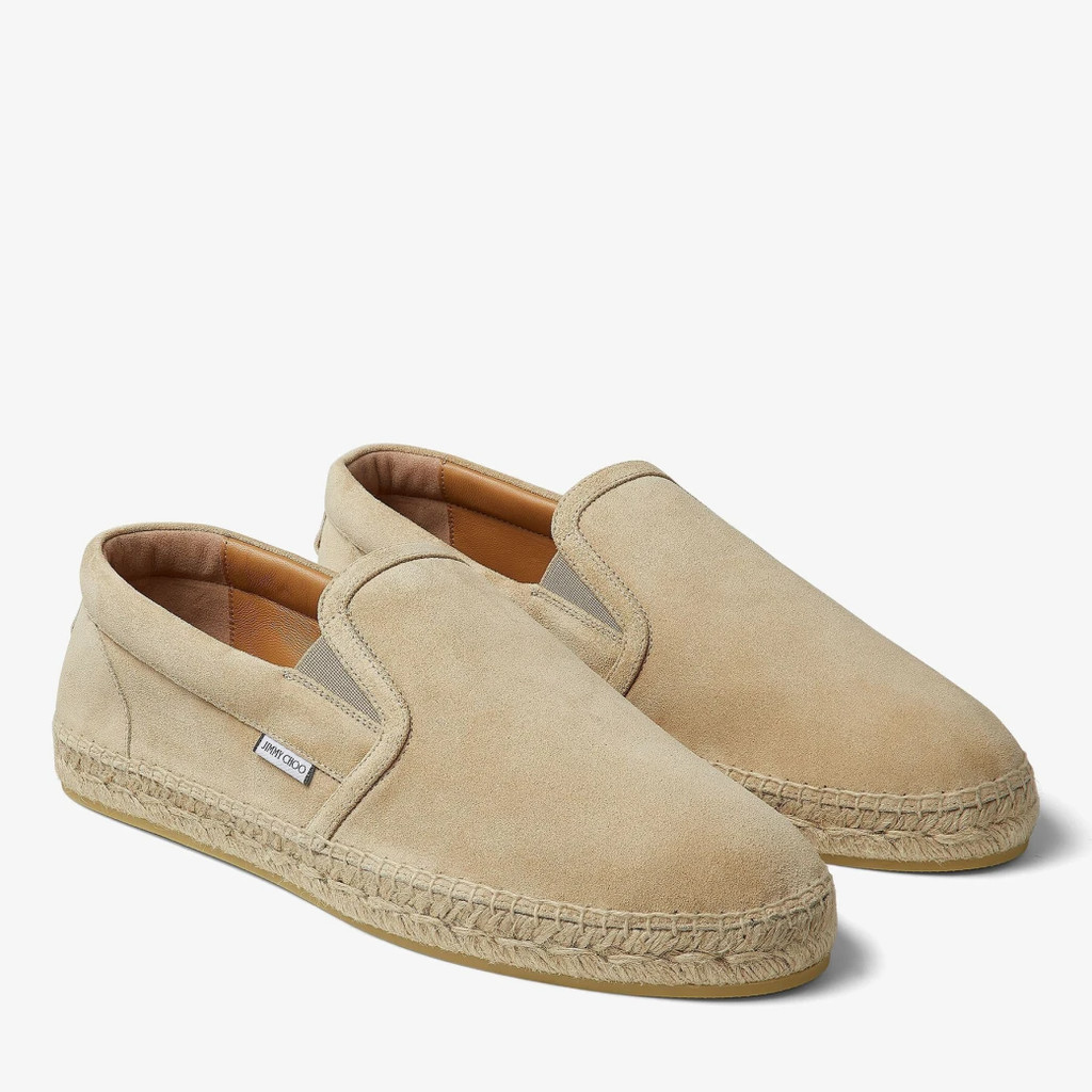 Jimmy Choo suede espadrille slip-ons for men, shown from an angled view featuring stylish design and casual slip-on style.
