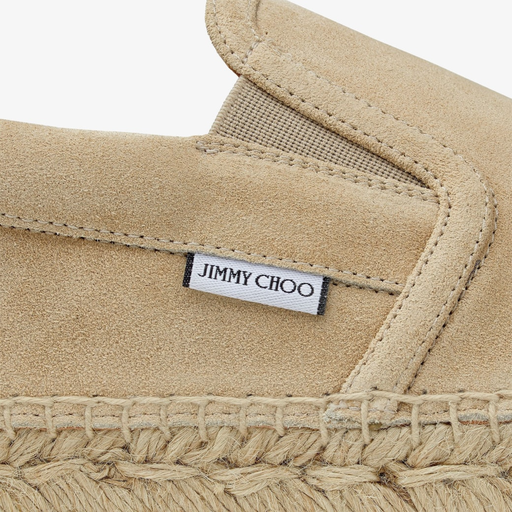 Men's Jimmy Choo suede espadrille slip-ons with beige woven soles and sleek brown suede upper, stylish and comfortable footwear.