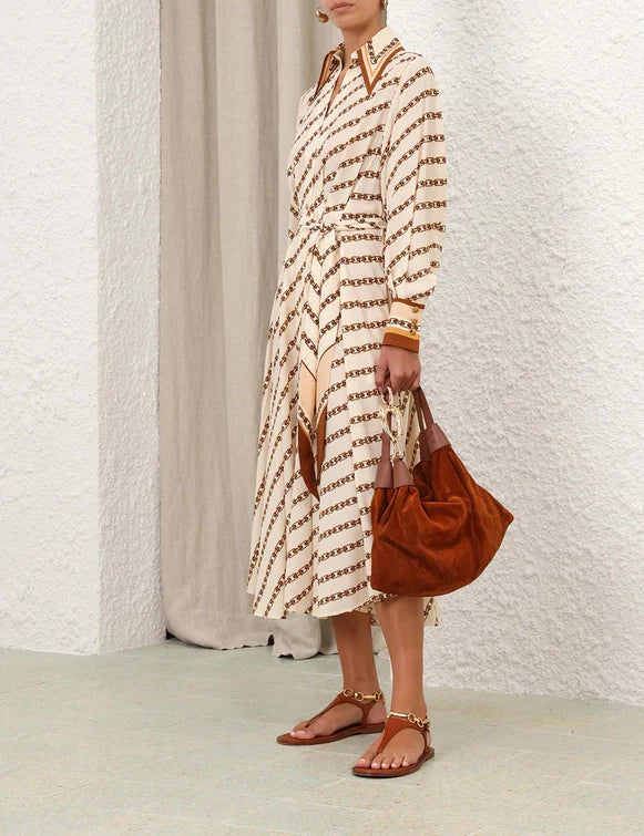 Cream Zimmermann Tuck Midi Shirt Dress for women, featuring a relaxed fit and button-down style, displayed on a hanger.