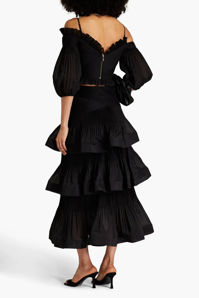Zimmermann pleated off-the-shoulder top and ruffle maxi skirt set in tiered plissé organza for women.